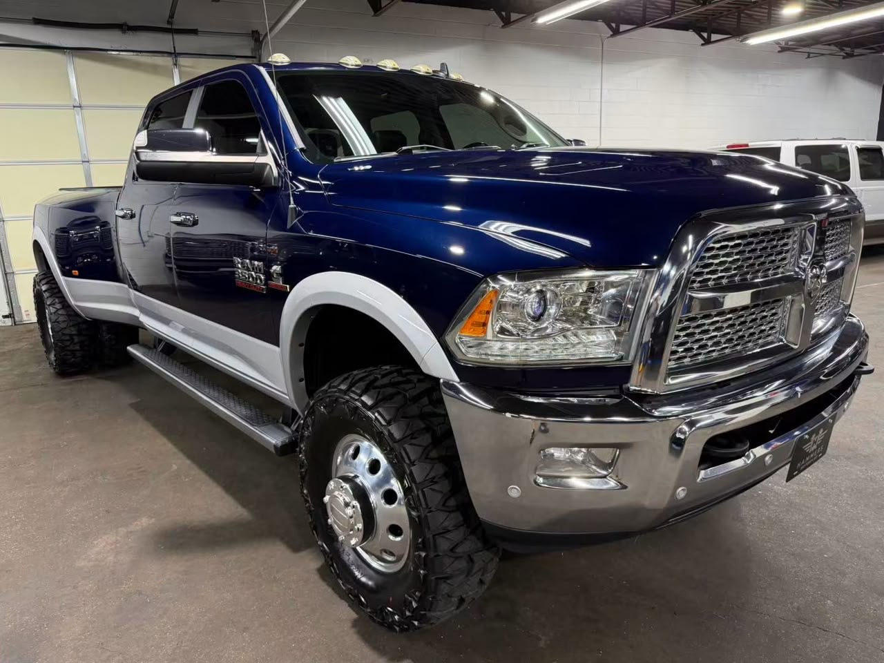 2017 Ram 3500 Laramie Dually front passenger-side quarter view